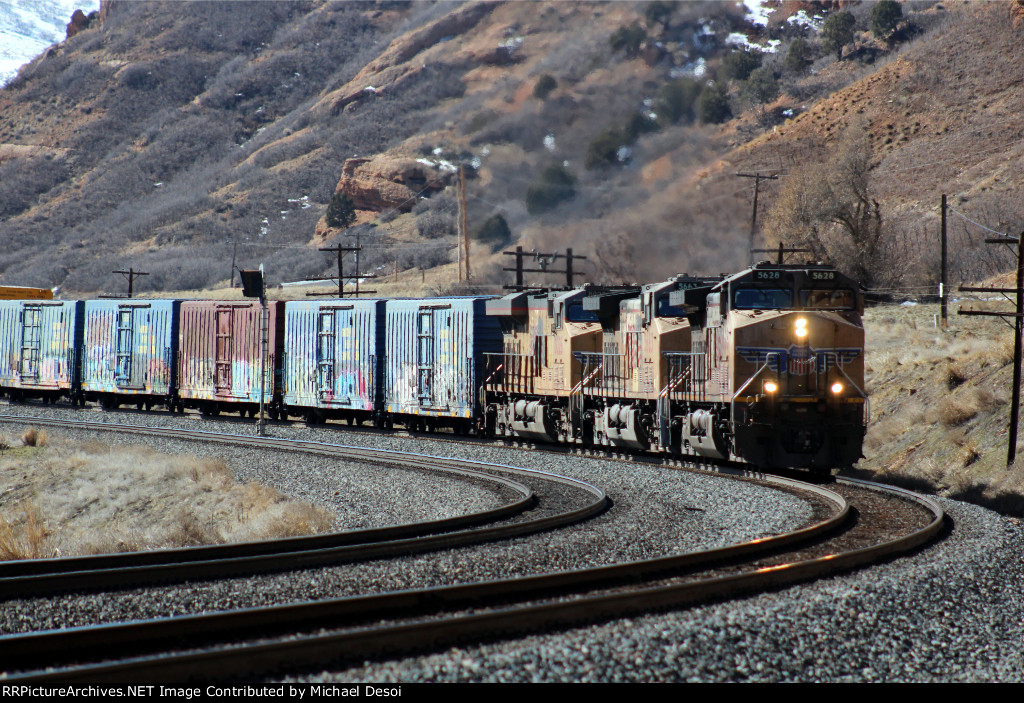 UP 5628, 5663, 8025 (C44ACCTE, C44ACCTE, C45ACCTE) lead an eastbound manifest through Echo Canyon, Utah. February 19, 2022 {Winter Echofest}